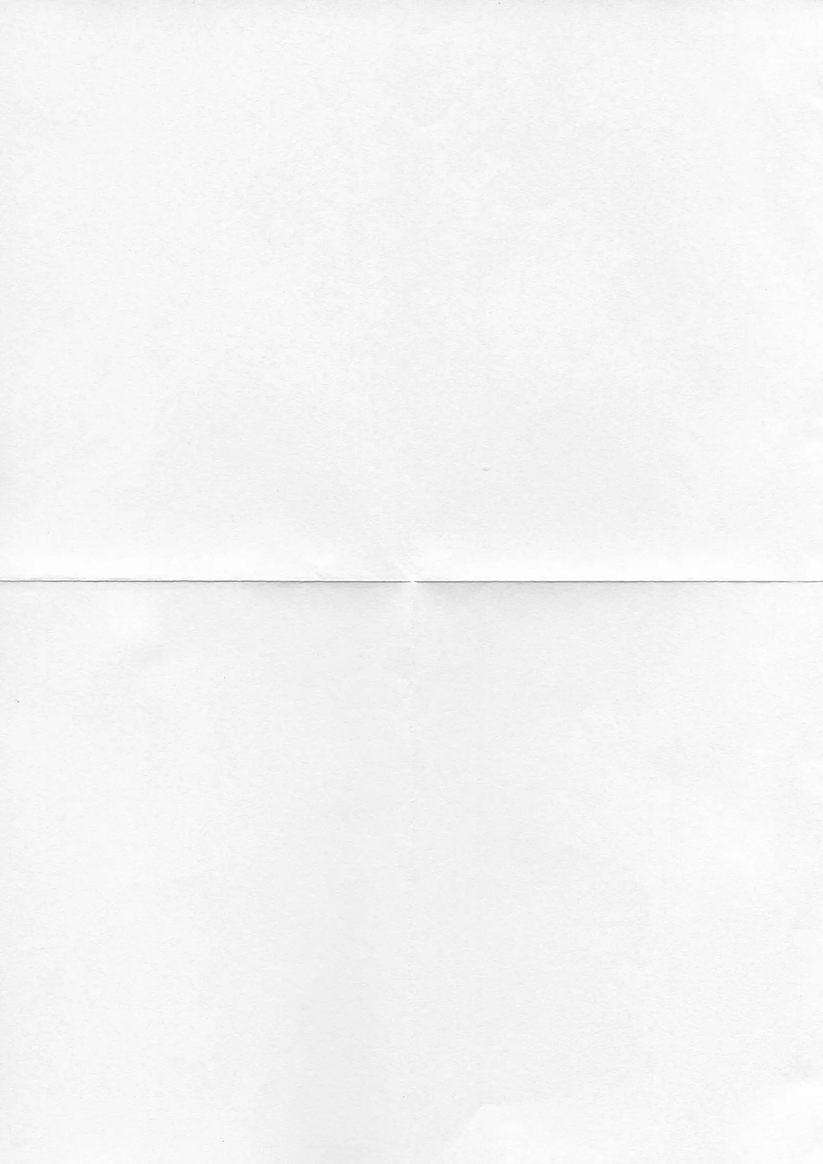 A plain sheet of white paper with a single horizontal fold, lit evenly from above.